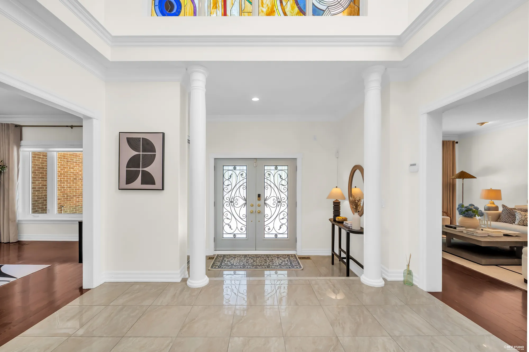 The foyer toward the front door, the poster for the 3D tour